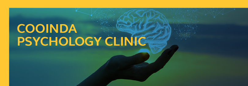 A graphic showing a blue brain in the palm of a hand that is silhouetted against a green and blue background.