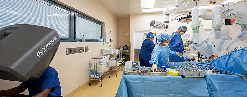 A surgeon manoeuvres the da Vinci robot during robotic surgery at Buderim Private Hospital. 